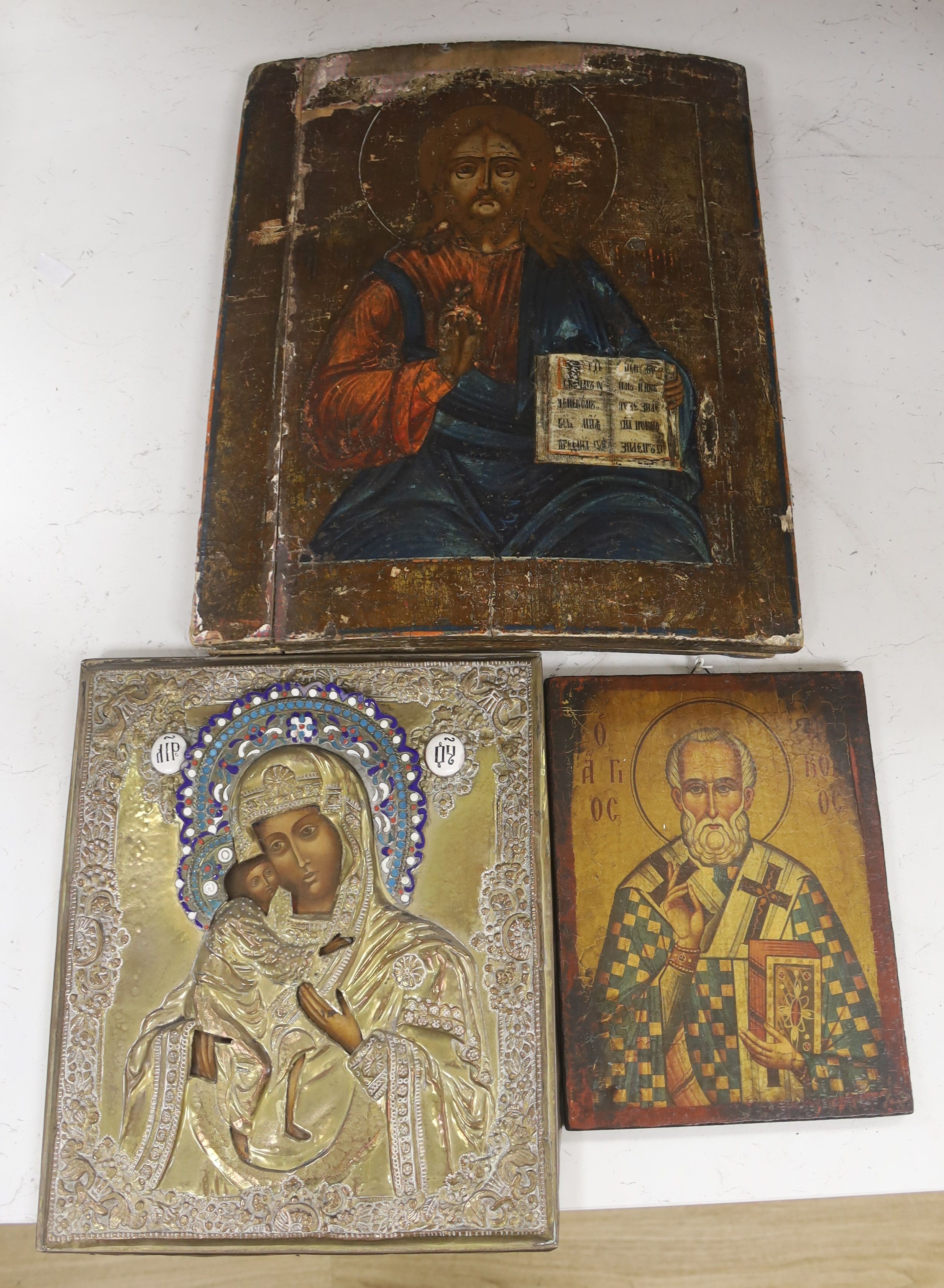 A 19th century Russian Icon and two others